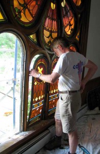 Taking out a stained glass panel